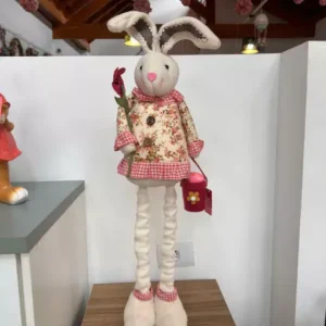 Coelha retrátil com casaco florido bege com rosa