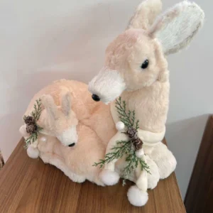 Rena creme deitada com filhote 37cm