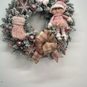 Guirlanda de Natal nevada com boneca rosa 60cm