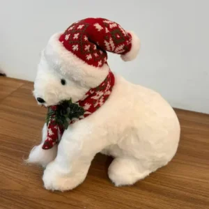 Urso sentado branco com gorro vermelho