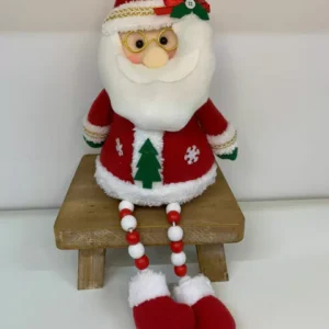 Papai Noel sentado com perninhas de bolas