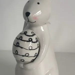 Coelho de porcelana com ovo com preto e branco 19cm