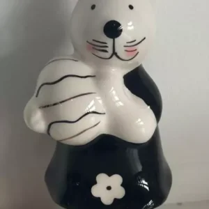 Coelho de porcelana com ovo com preto e branco 13cm