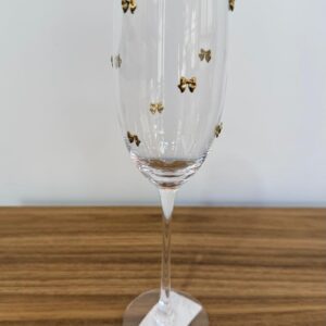 Taça campanhe cristal com laços dourados 25x6cm