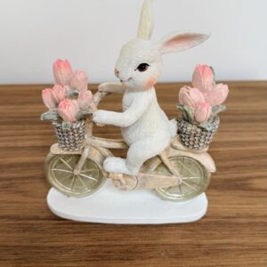Coelha na bicicleta de resina 15cm